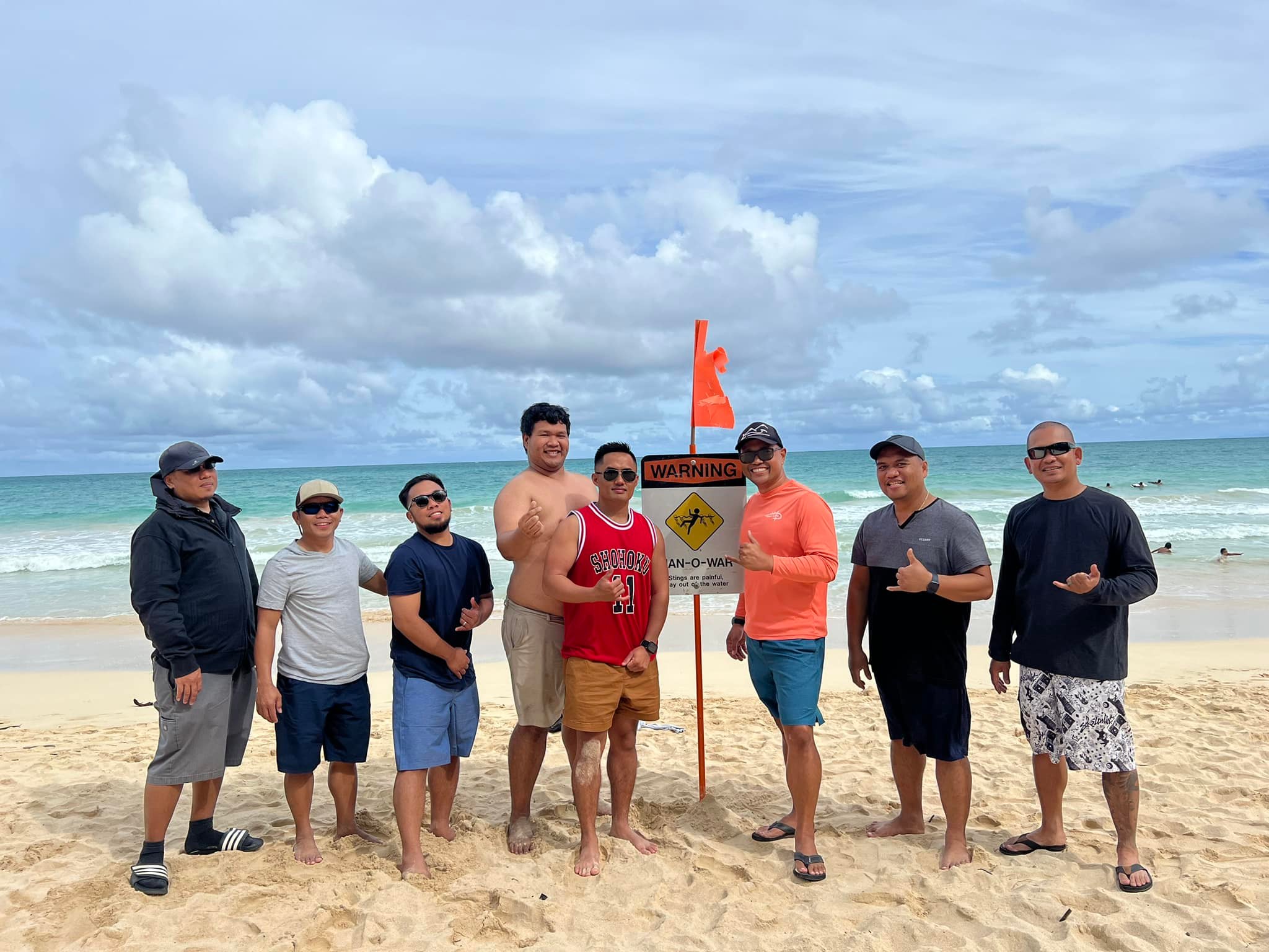 Church members enjoying fellowship at the beach together.