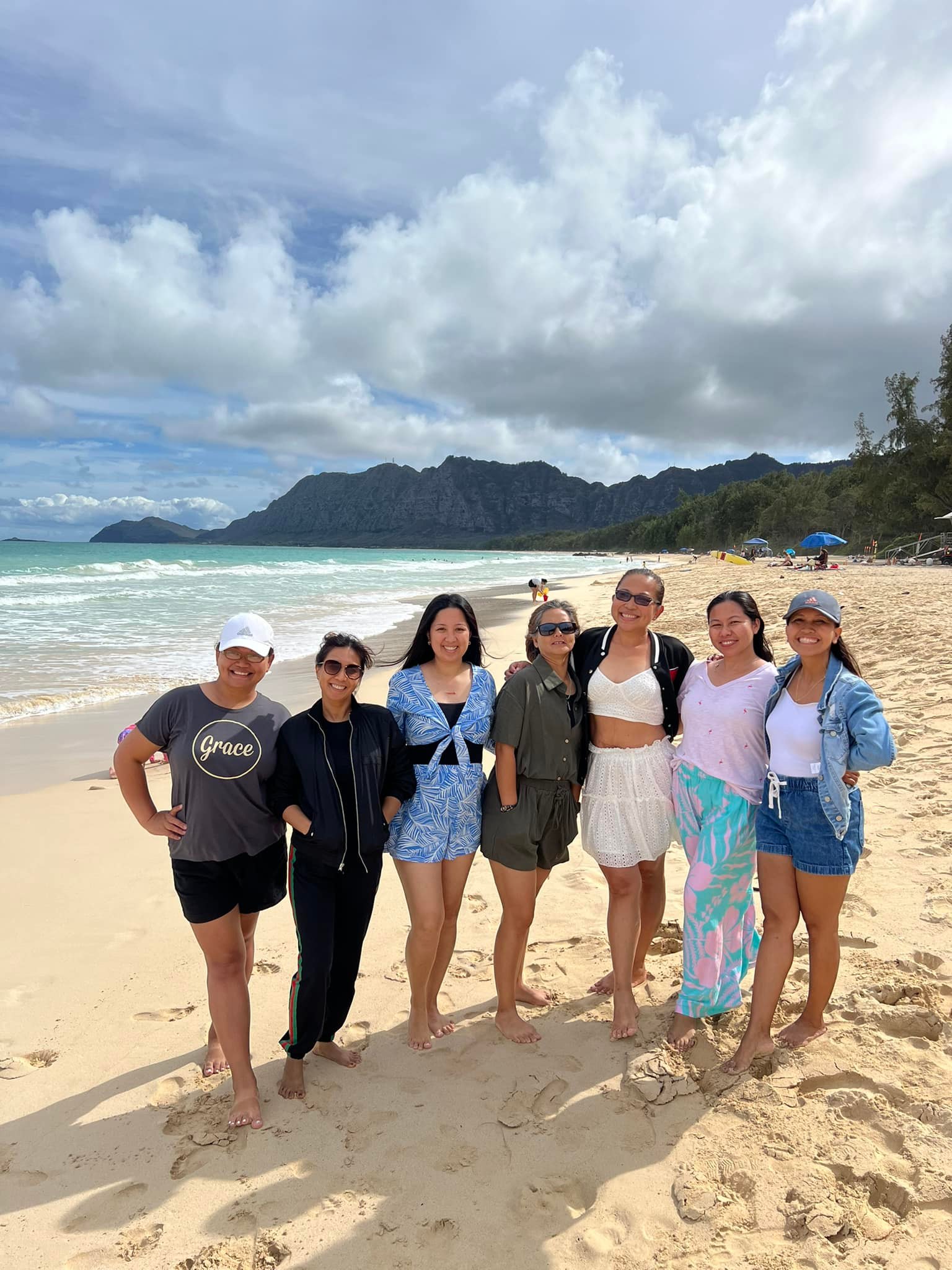 Church family fellowship at the beach enjoying time together.